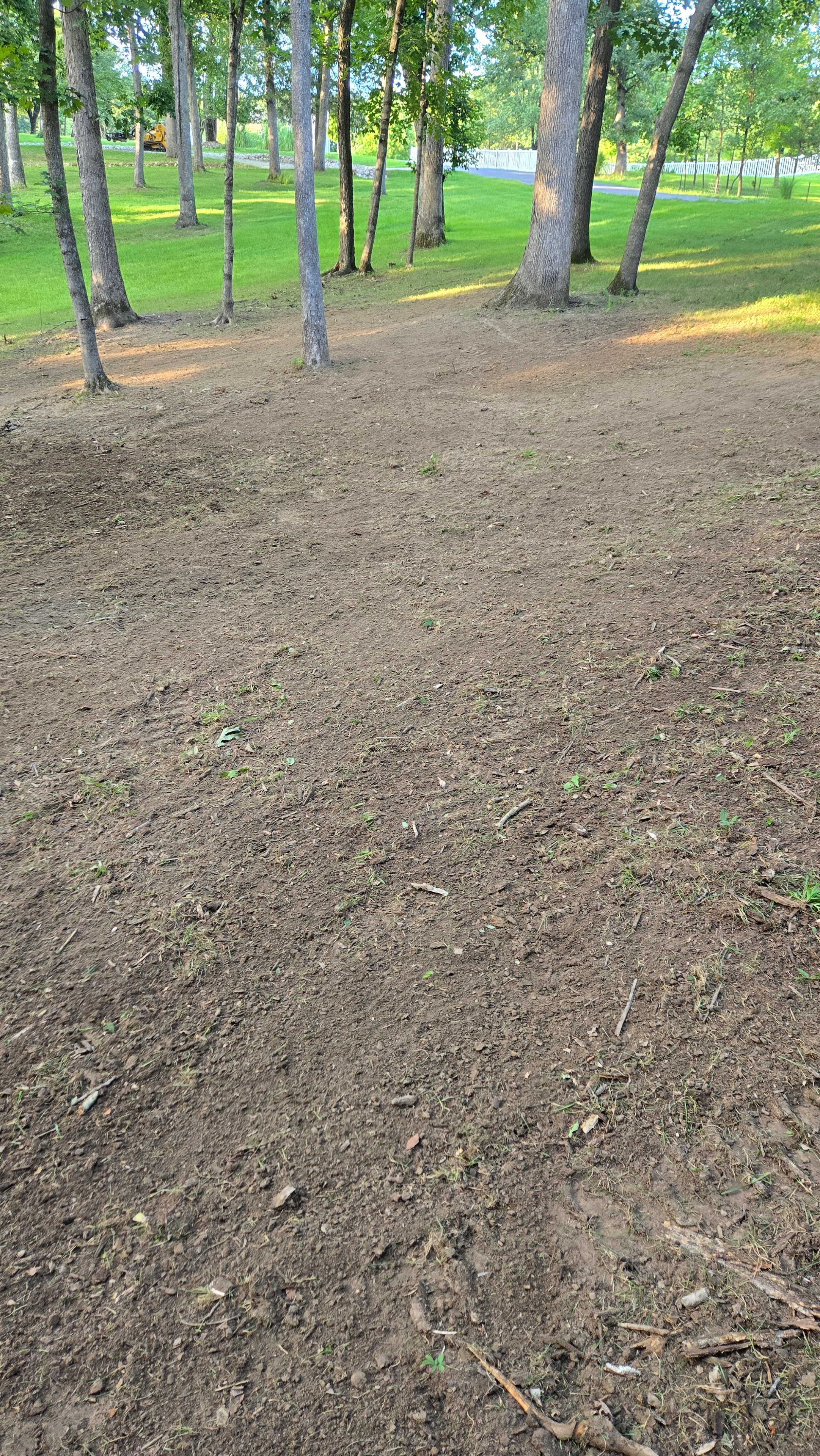 Bare dirt front yard graded and ready for hydroseeding